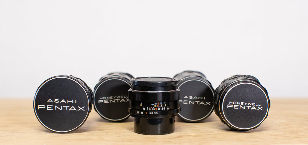 Super Takumar 28mm f3.5, 35mm f3.5, 50mm f1.4, 105mm f2.8, and 135mm f3.5 M42 mount lenses.